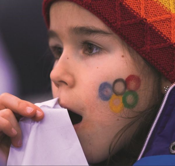 Girl with Olympics facepaint.